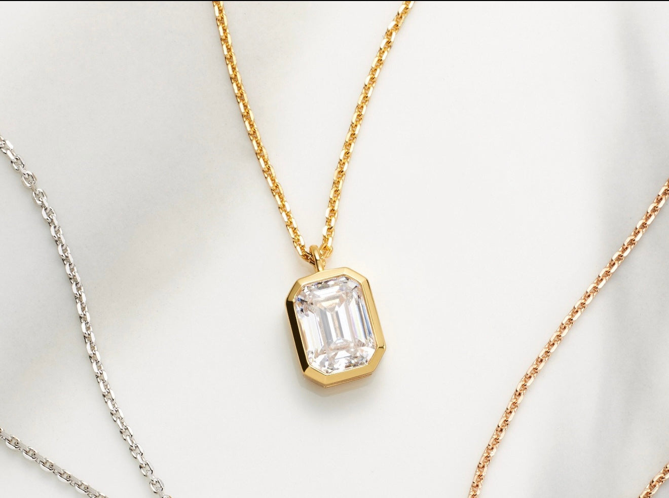 Bezel Set Emerald Cut Elongated Behind the Stone Necklace